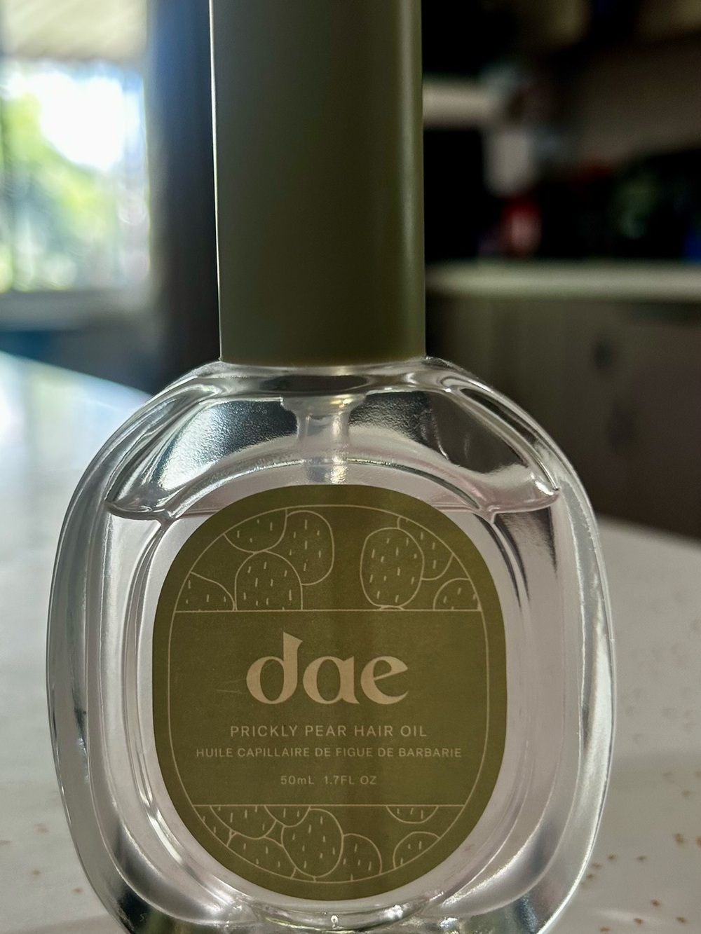 American Eagle Outfitters Dae Prickly Pear Hair Oil - Olive Green Bottle